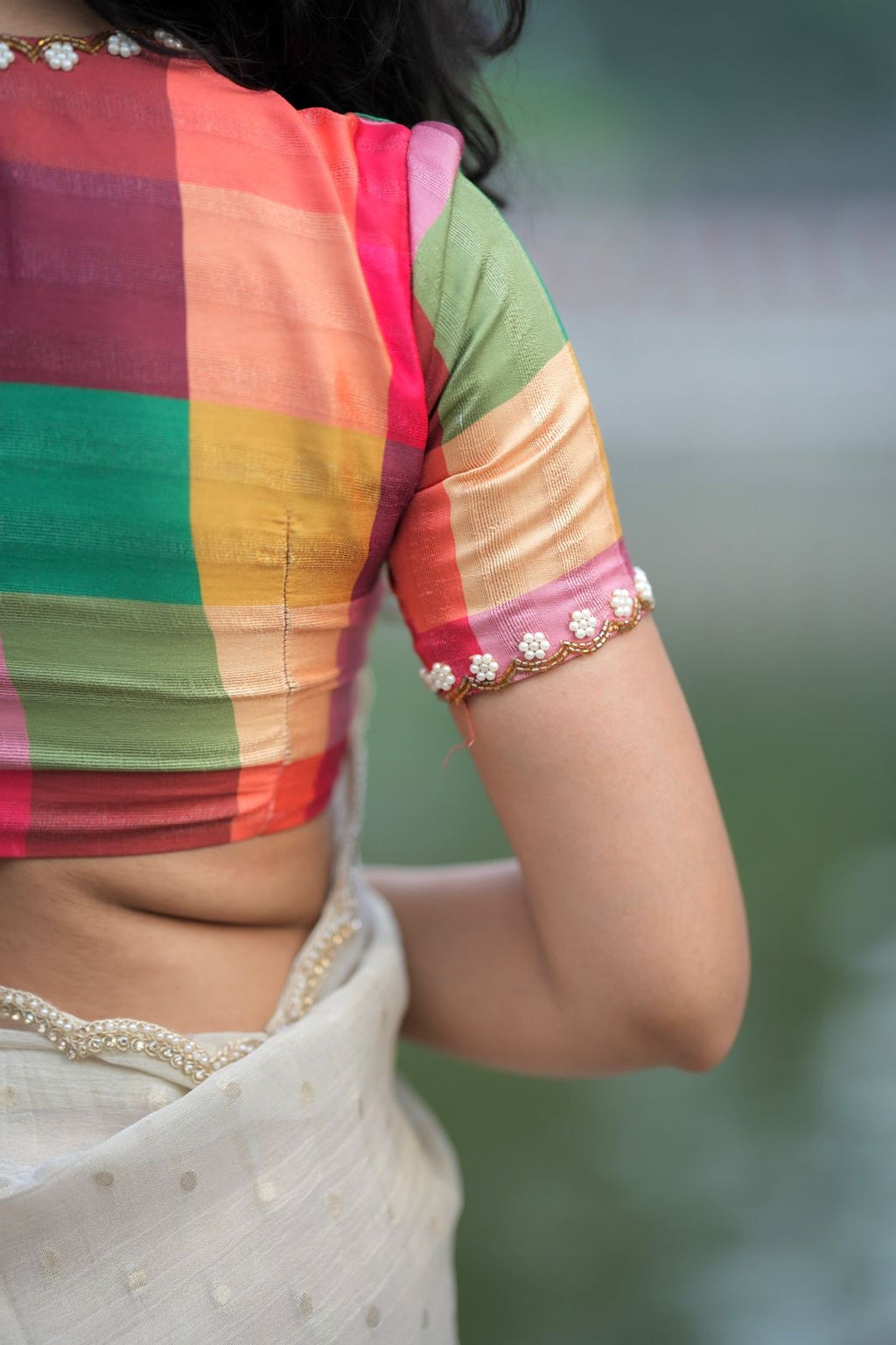 Beige georgette tissue saree with multi hand work blouse