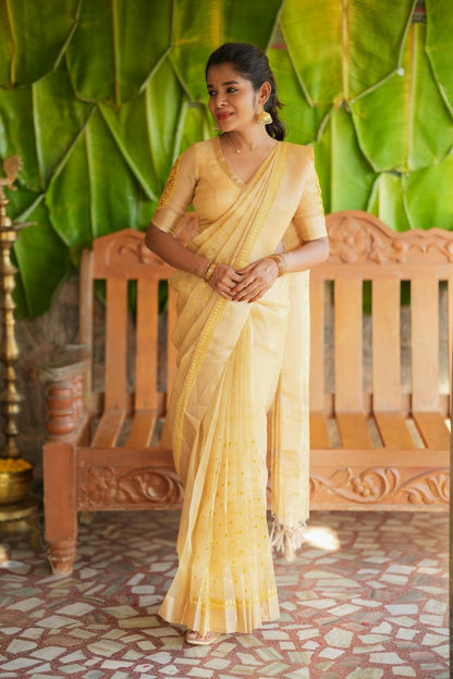 Gold kota doria saree with hand work blouse