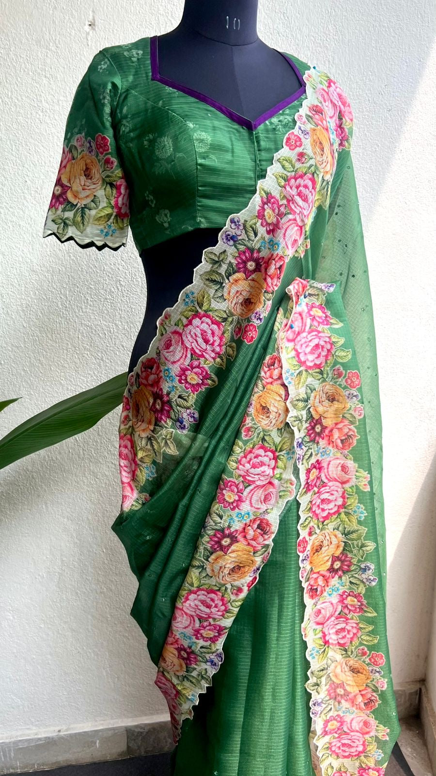 Green floral kota doria saree with patterned blouse