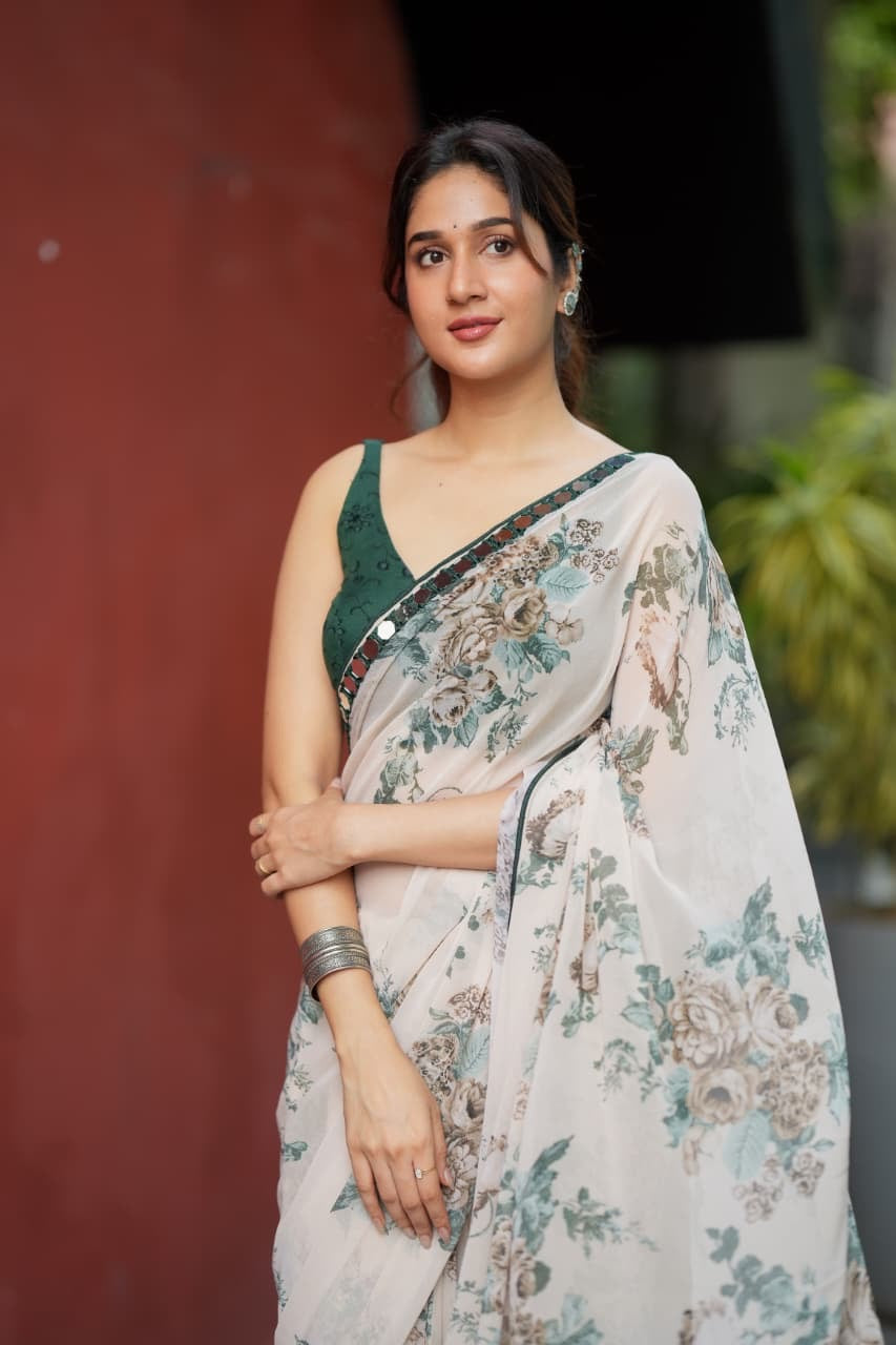 Half white chiffon floral saree with hand work blouse