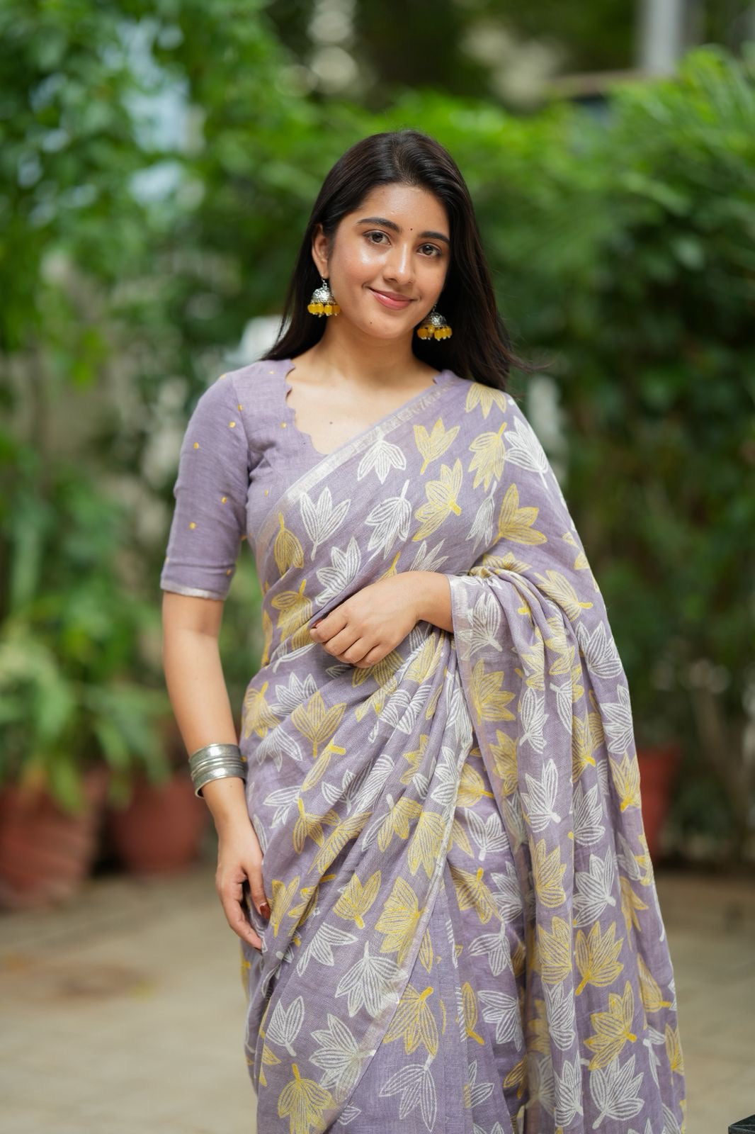 Lavender linen floral saree with hand work blouse