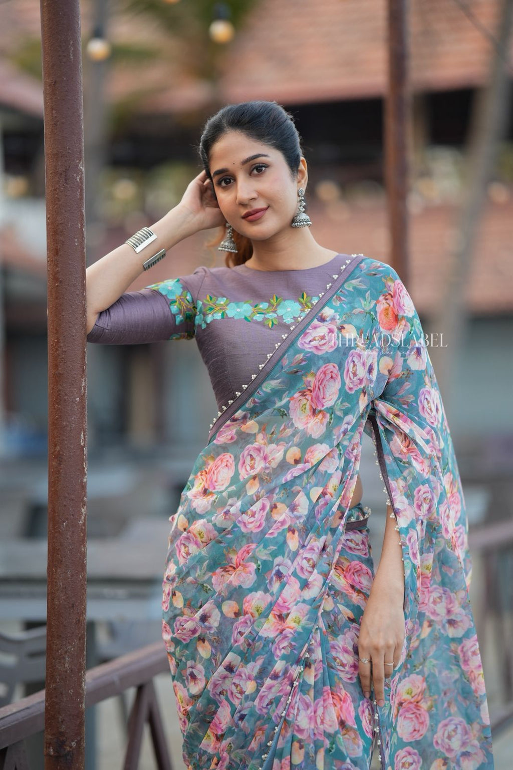 Blue floral georgette saree with grey embroidery blouse