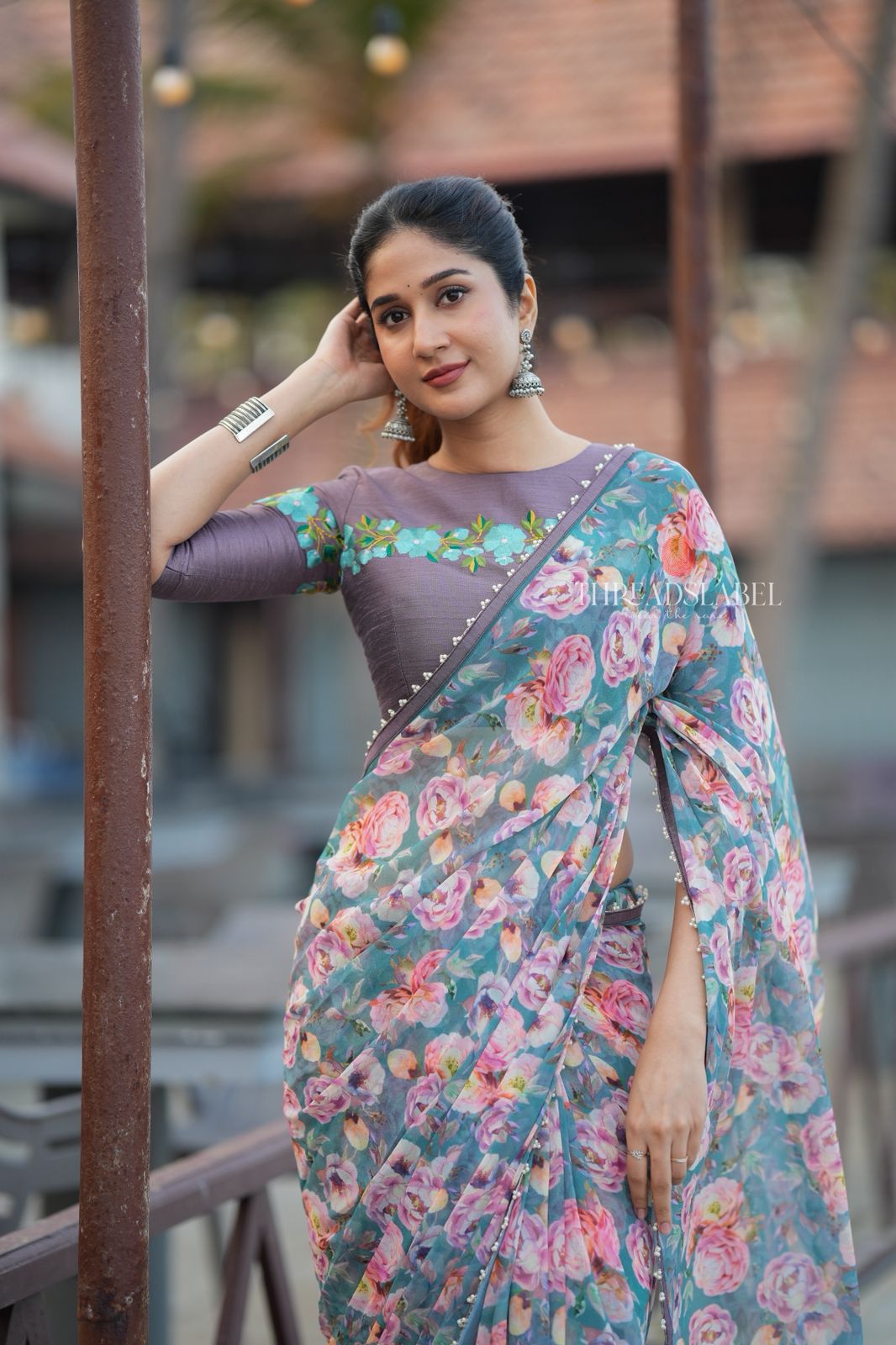 Blue floral georgette saree with grey embroidery blouse