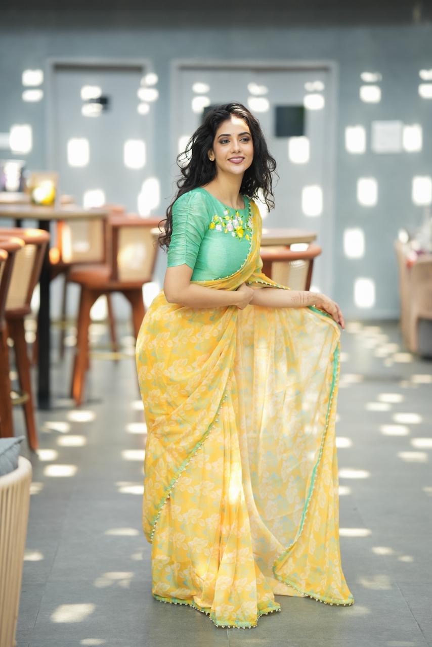 Green tissue floral hand work blouse (only blouse)