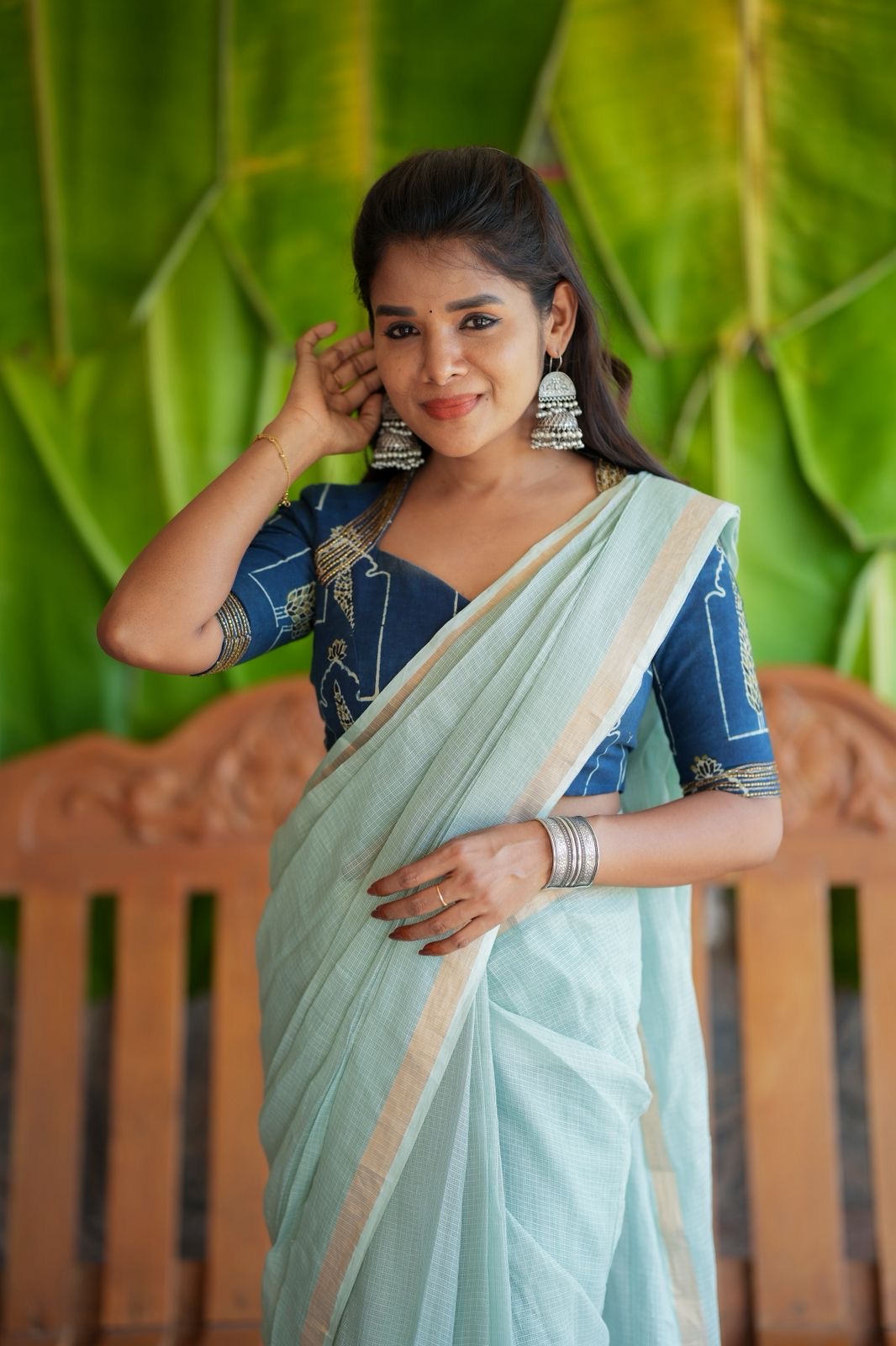 Aqua blue kota doria saree with hand work blouse