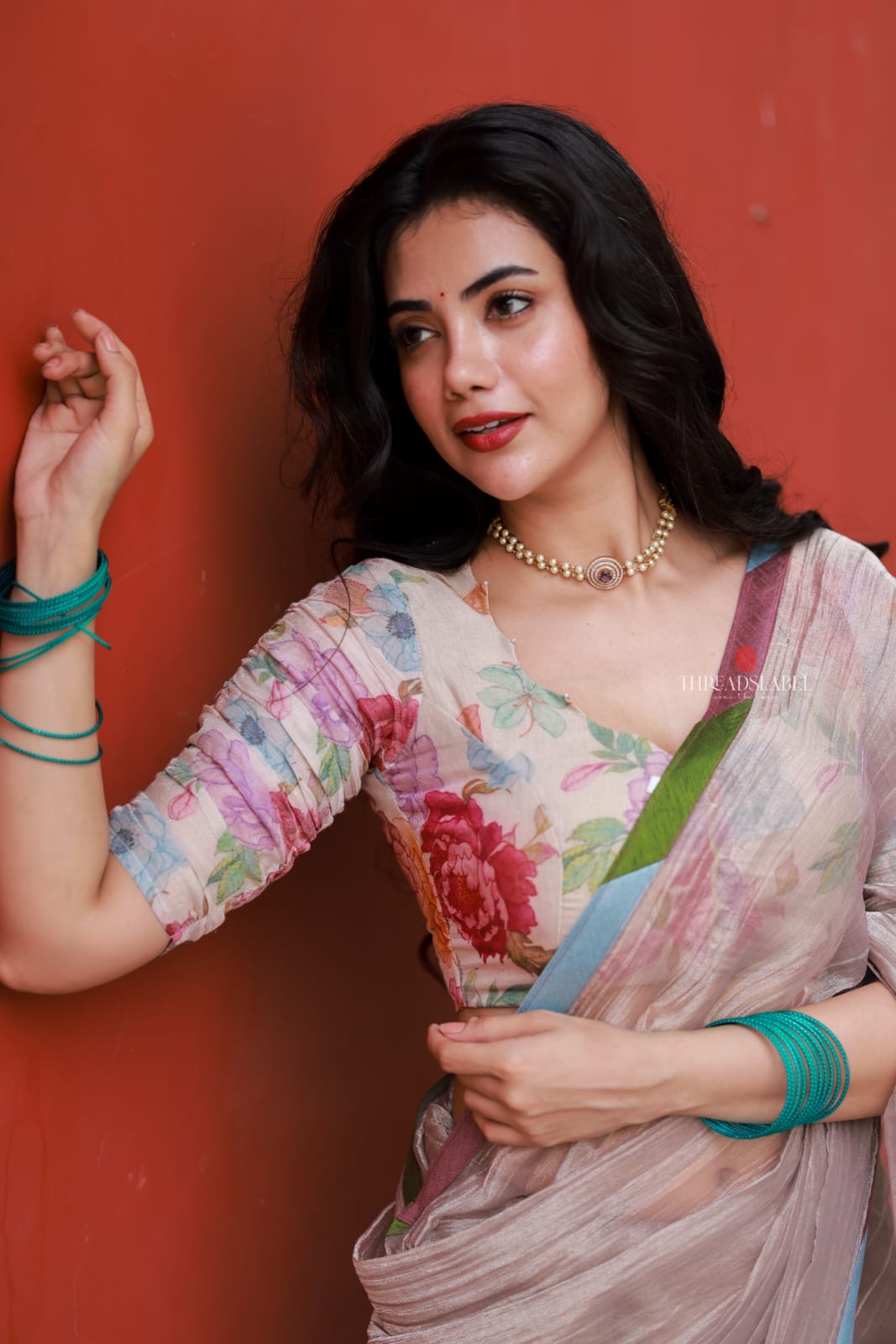 Dusty silver tissue saree with pearl hand work blouse