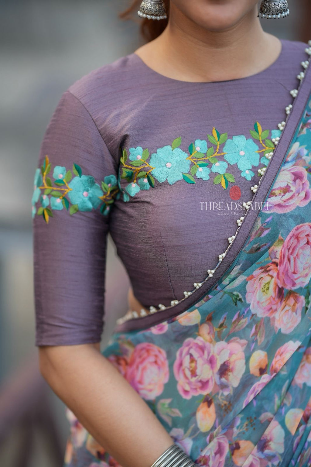 Blue floral georgette saree with grey embroidery blouse