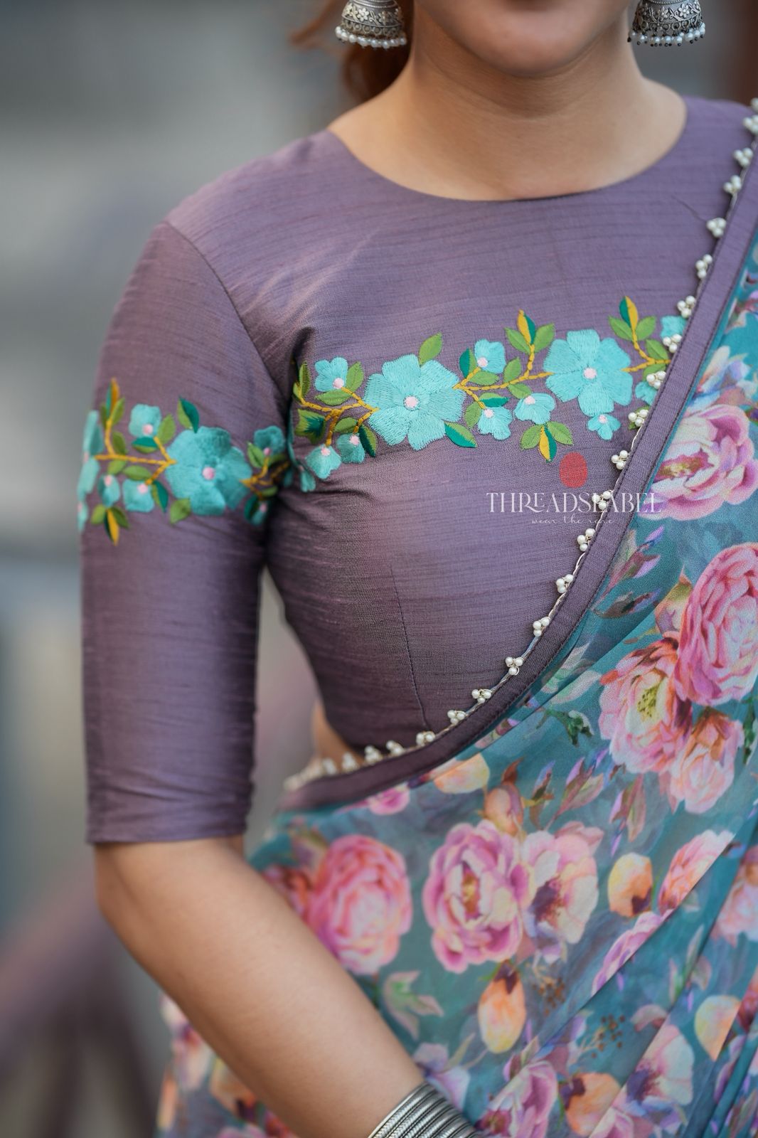 Blue floral georgette saree with grey embroidery blouse