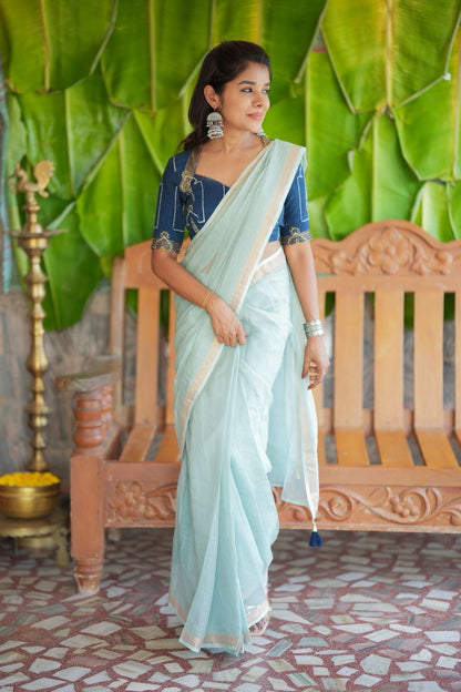 Aqua blue kota doria saree with hand work blouse