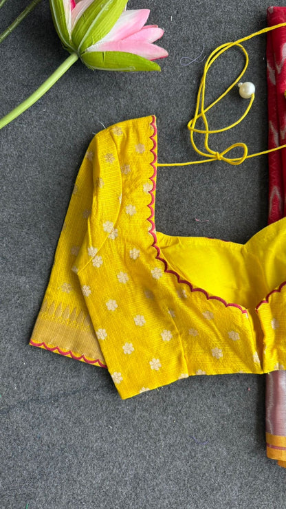 Red soft kota silk saree with yellow embroidered blouse