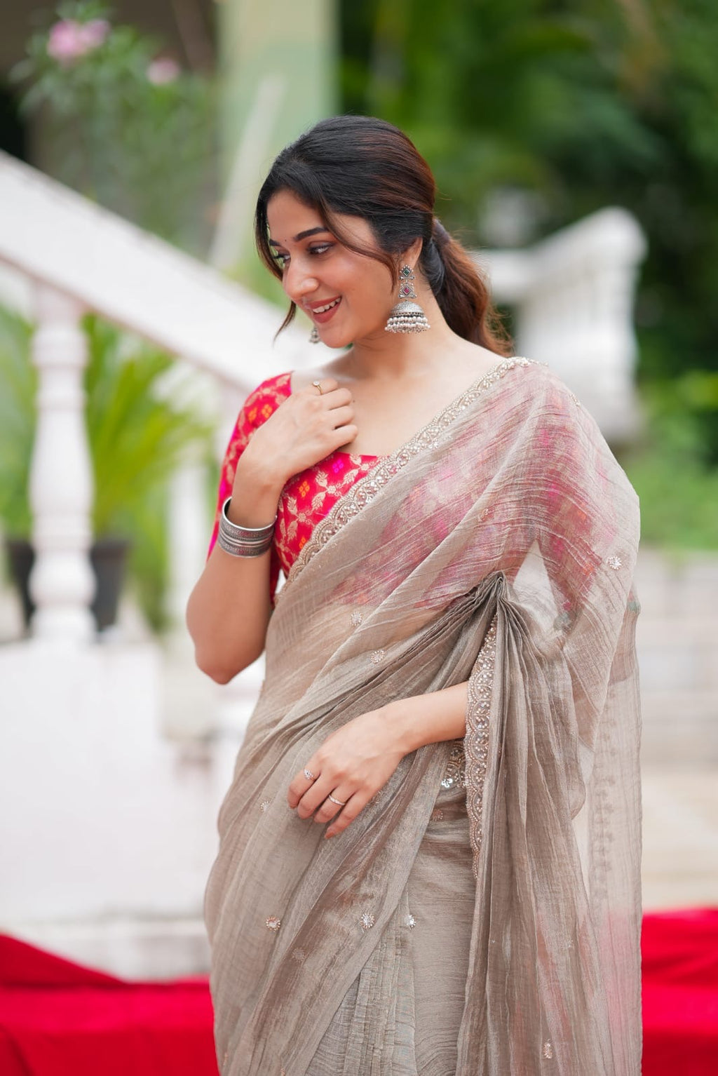 Grey tissue saree with red banarasi blouse