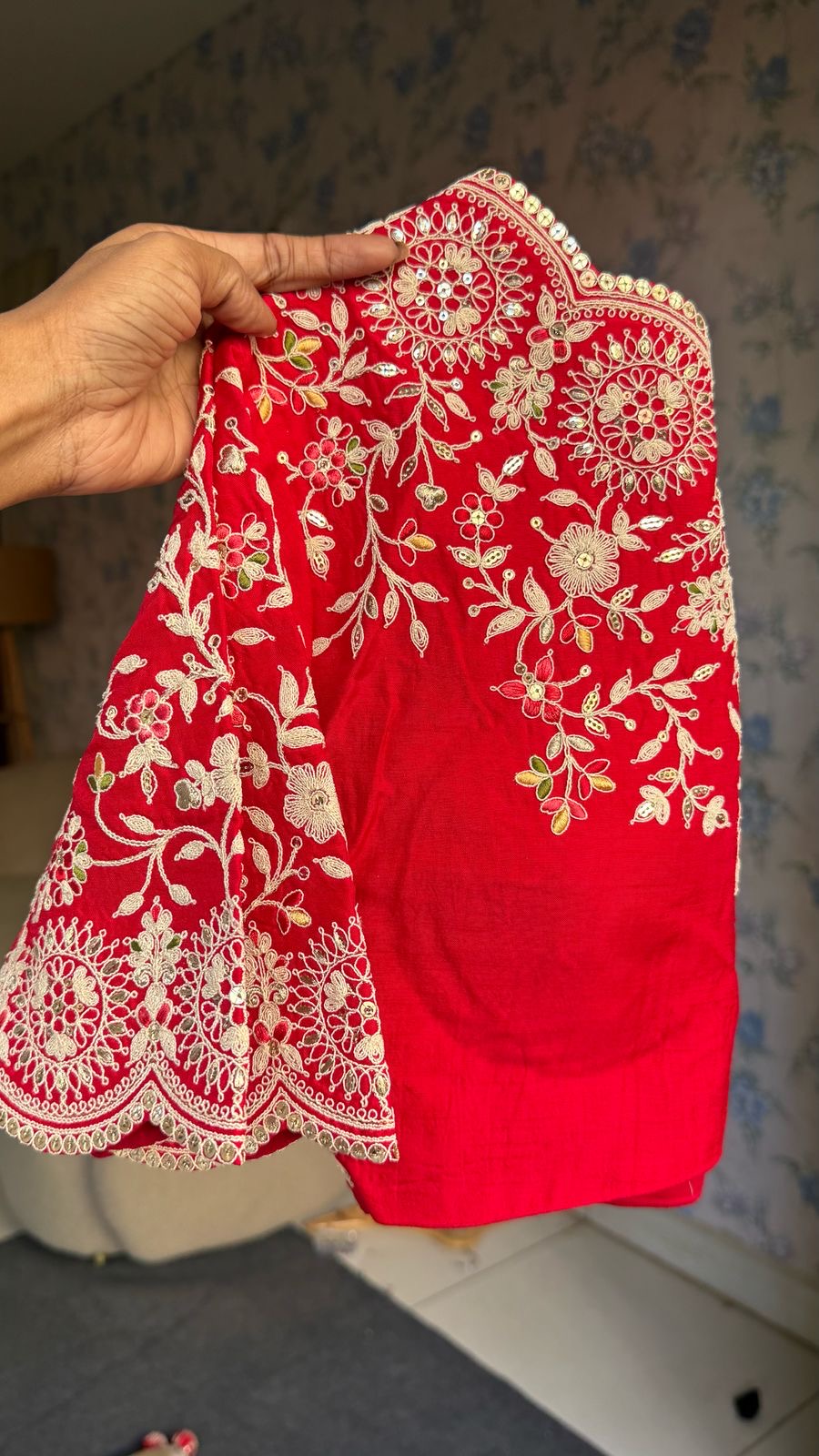 Cream tissue stripped saree with red silk hand work blouse