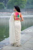 Beige georgette tissue saree with multi hand work blouse