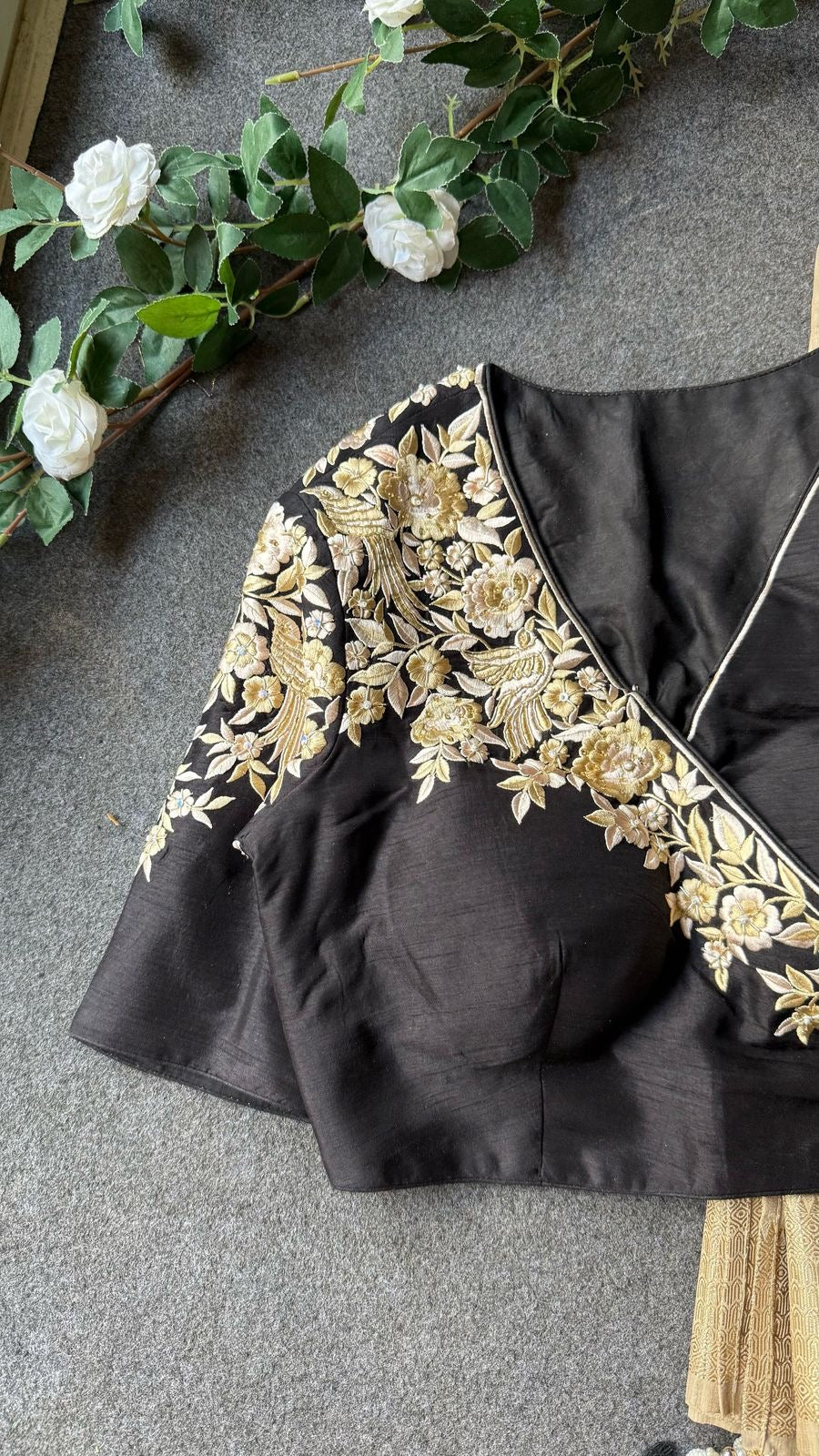 Golden cream tissue saree with black hand work blouse