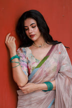 Dusty silver tissue saree with pearl hand work blouse