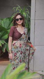 Sage green floral chiffon saree with hand work blouse