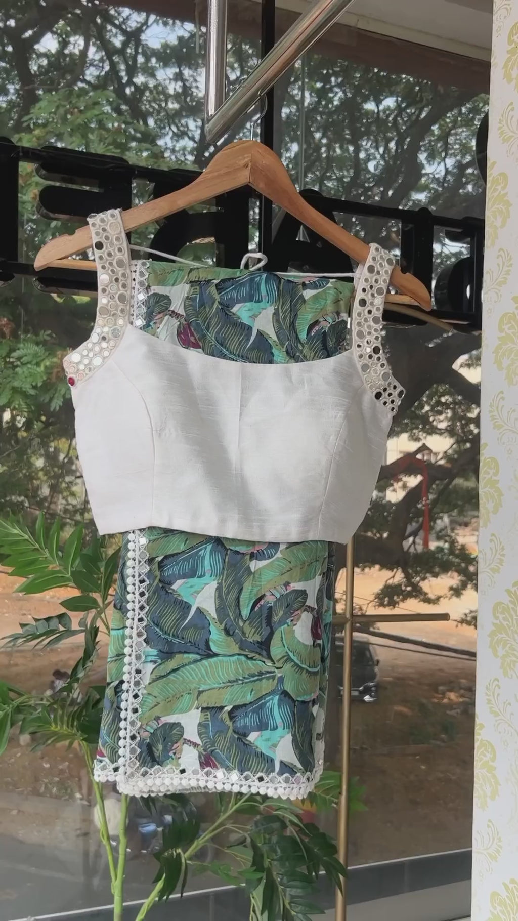 Green floral cotton saree with mirror worked blouse