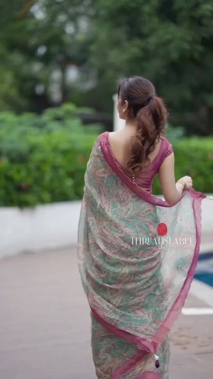 Jade green viscose jute saree with pink tissue blouse