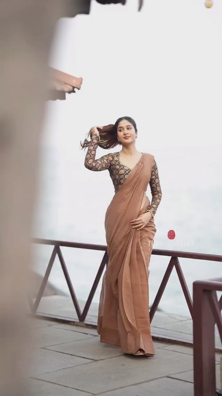 Brown malai chanderi saree with Ajrak print blouse