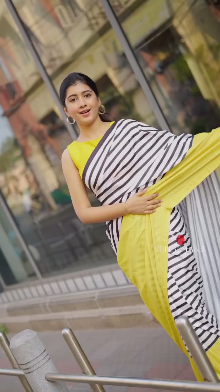 Black & white striped kossa saree with yellow embroidery blouse