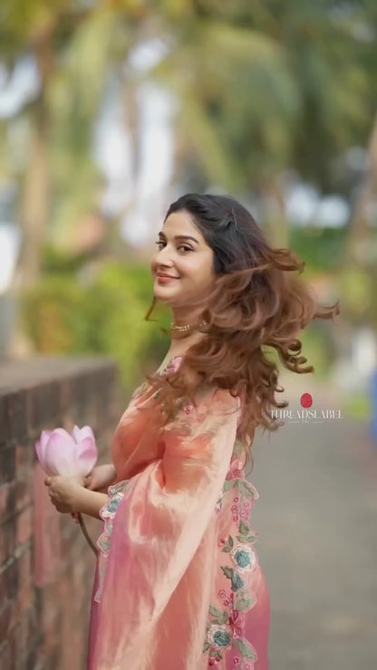 Peach soft tissue saree with embroidery blouse