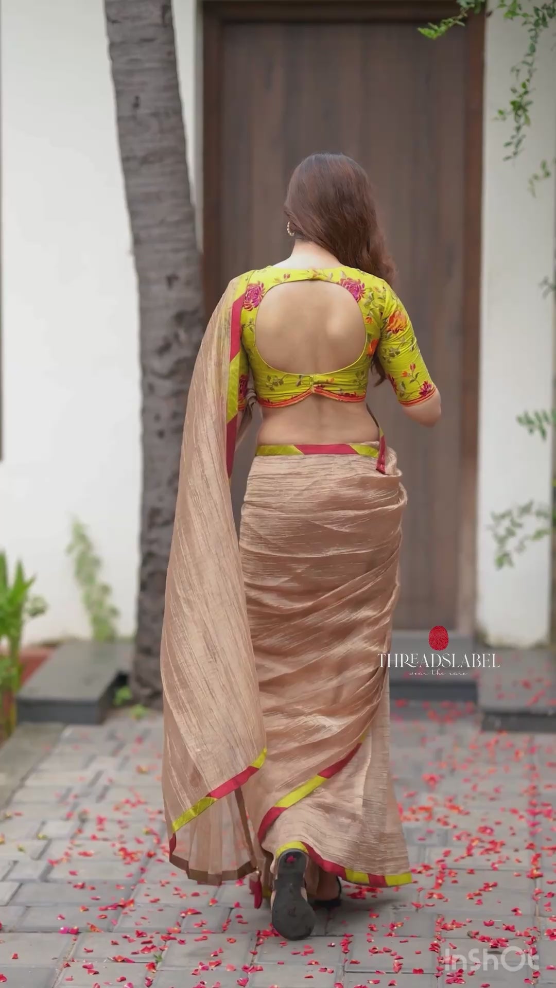 Orange rust saree with tissue handwork blouse