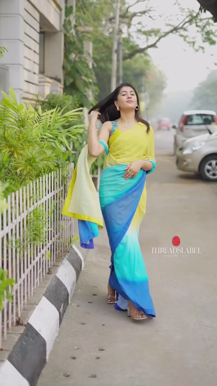 Multi georgette saree with yellow hand made blouse