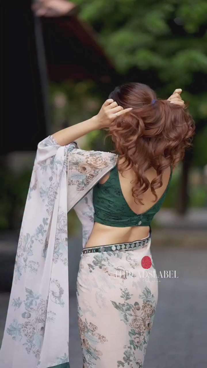 Half white chiffon floral saree with hand work blouse