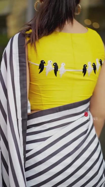 Black & white striped kossa saree with yellow embroidery blouse