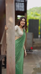 Green mul chanderi saree with halfwhite embroidery blouse