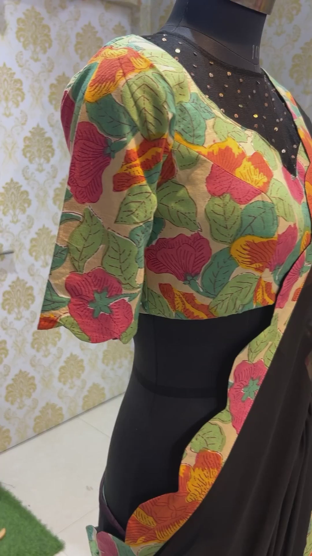 Black georgette saree with floral cotton blouse