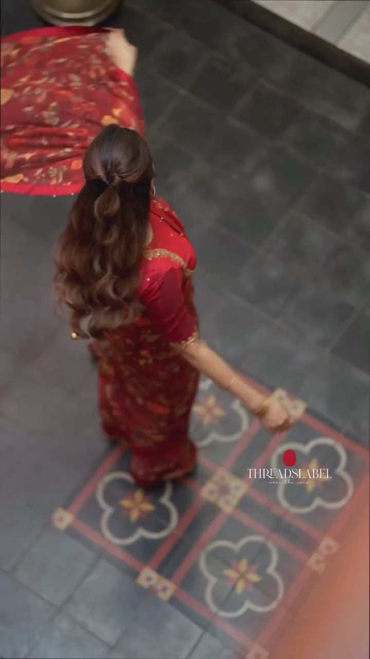 Maroon chiffon floral saree with hand work blouse
