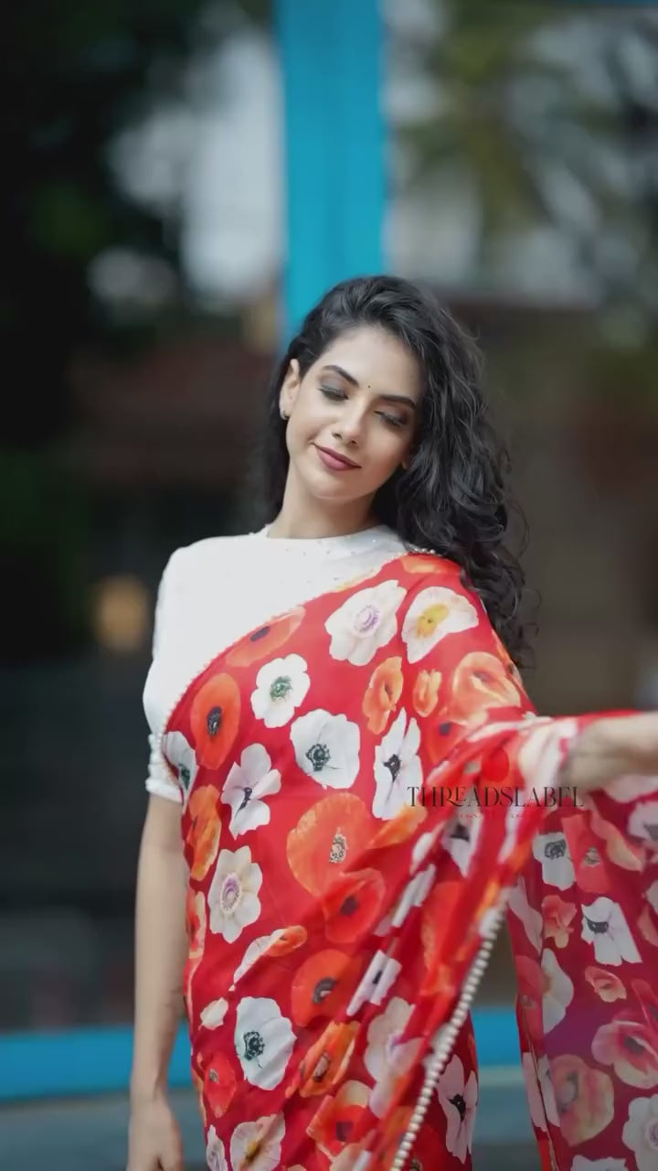 Orange red chinnon silk saree with white organza blouse
