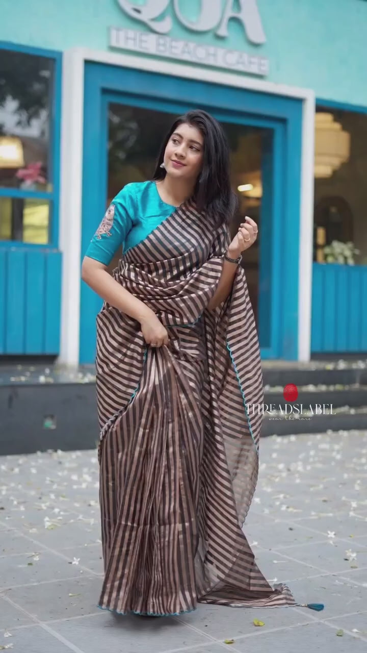 Black & copper stripped tissue saree with bird work blouse