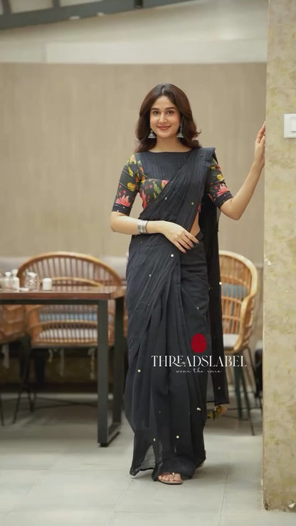 Blue floral tissue saree with lime hand work blouse