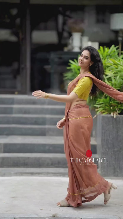 Brown soft organza saree with lime green ikkat blouse