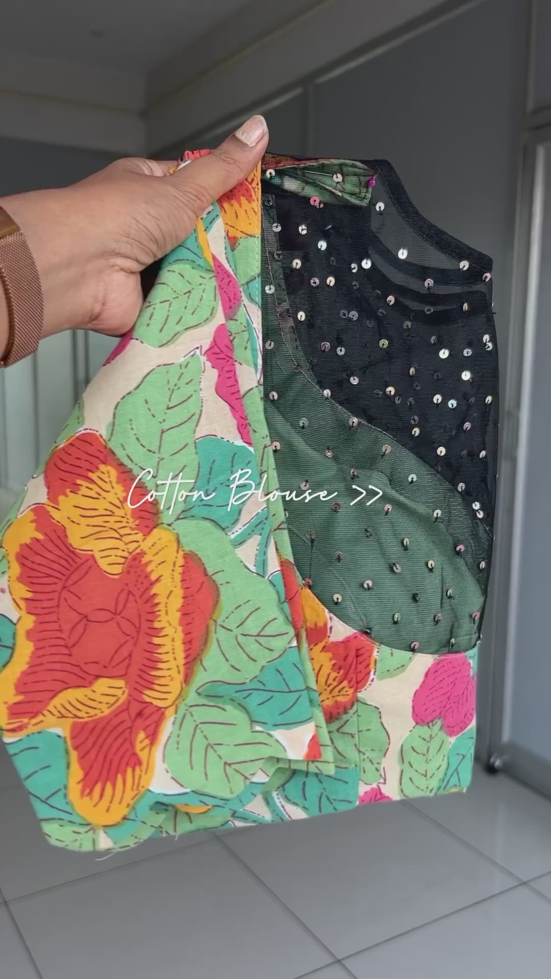 Black georgette saree with floral cotton blouse