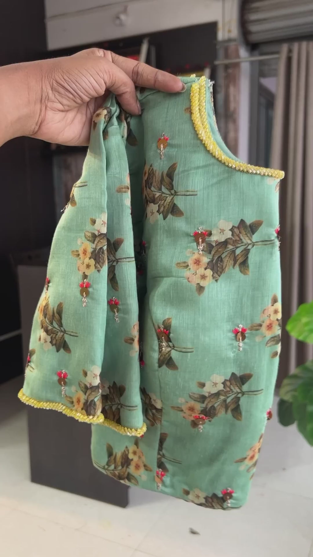 Yellow checked organza saree with hand work blouse