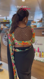 Black georgette saree with floral cotton blouse