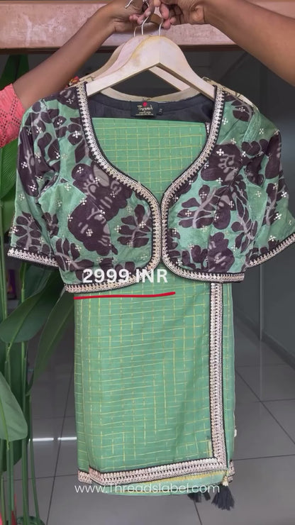 Apple green checked organza saree with velvet embroidery blouse