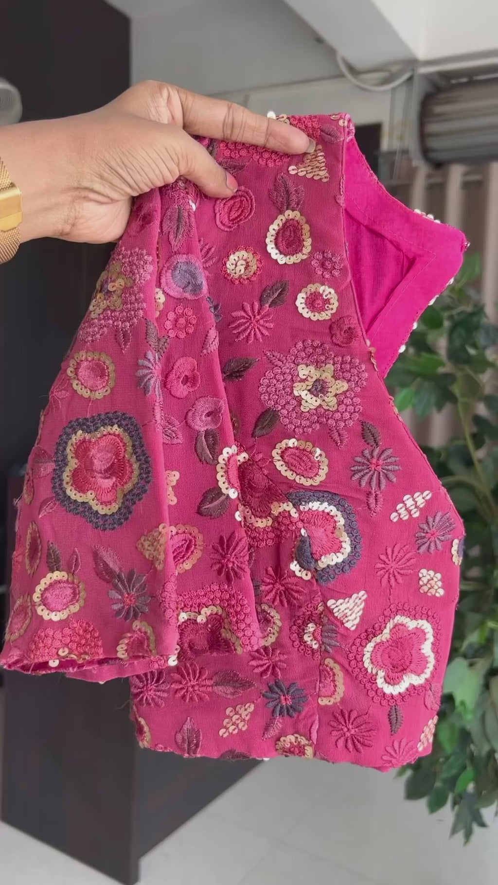Deep pink organza saree with embroidered blouse
