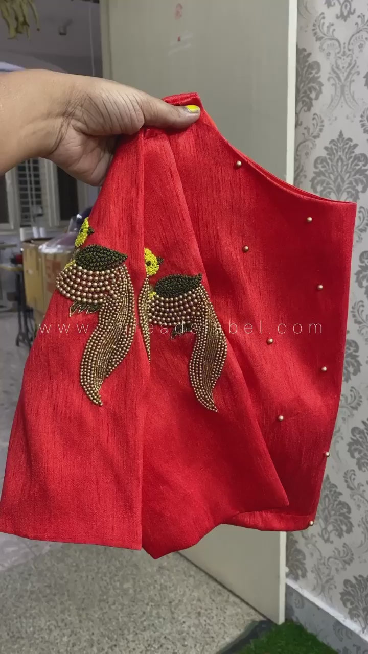 Red silk bird motif hand worked blouse