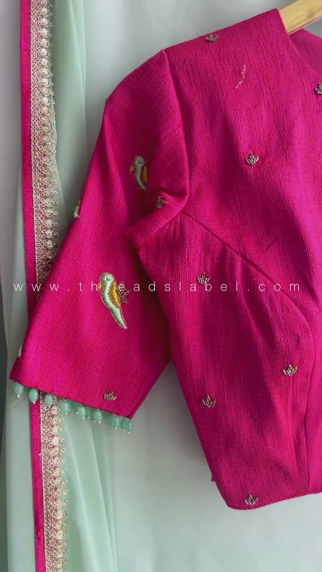 Mint soft organza saree with pink handwork blouse