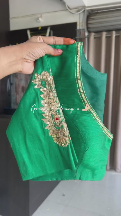 Honey jute saree with green hand worked paisley blouse