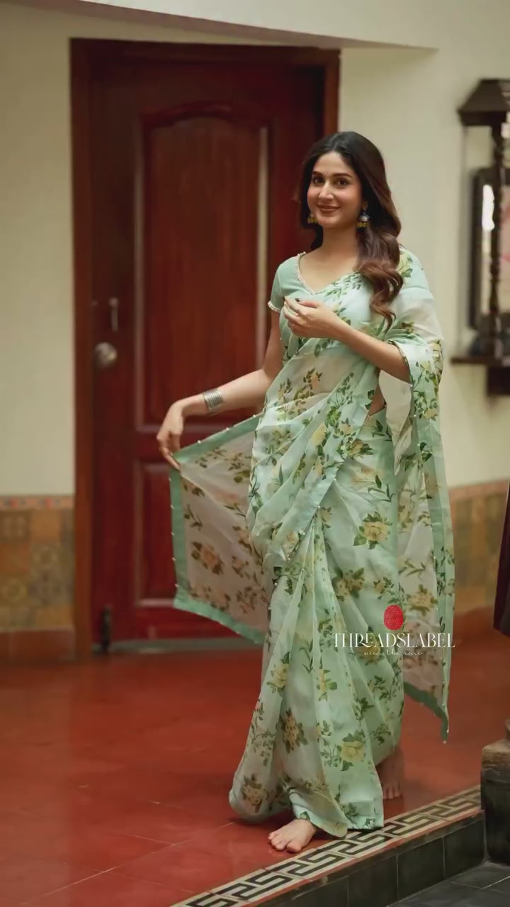Sea green viscose jute floral saree (only saree)