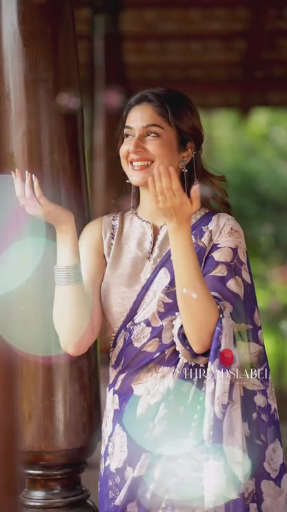 Purple chiffon floral saree with hand work blouse