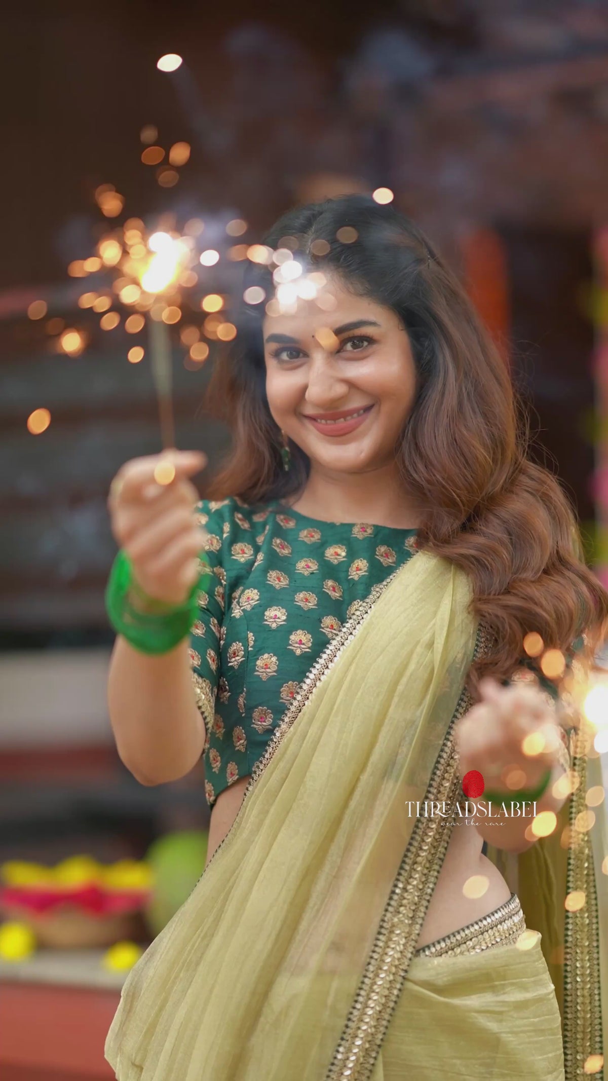 Gold tissue saree with green hand work blouse