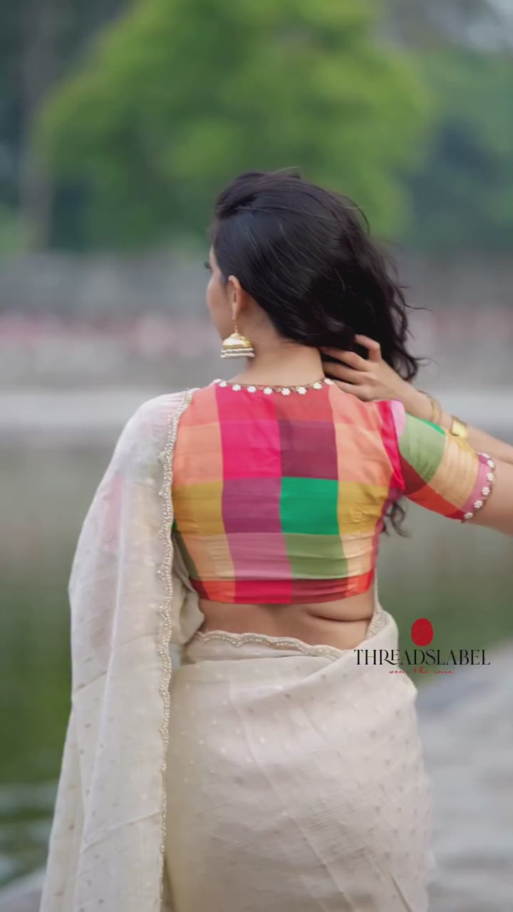 Beige georgette tissue saree with multi hand work blouse