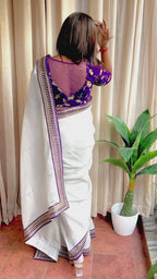 Silver silk saree with purple hand work blouse