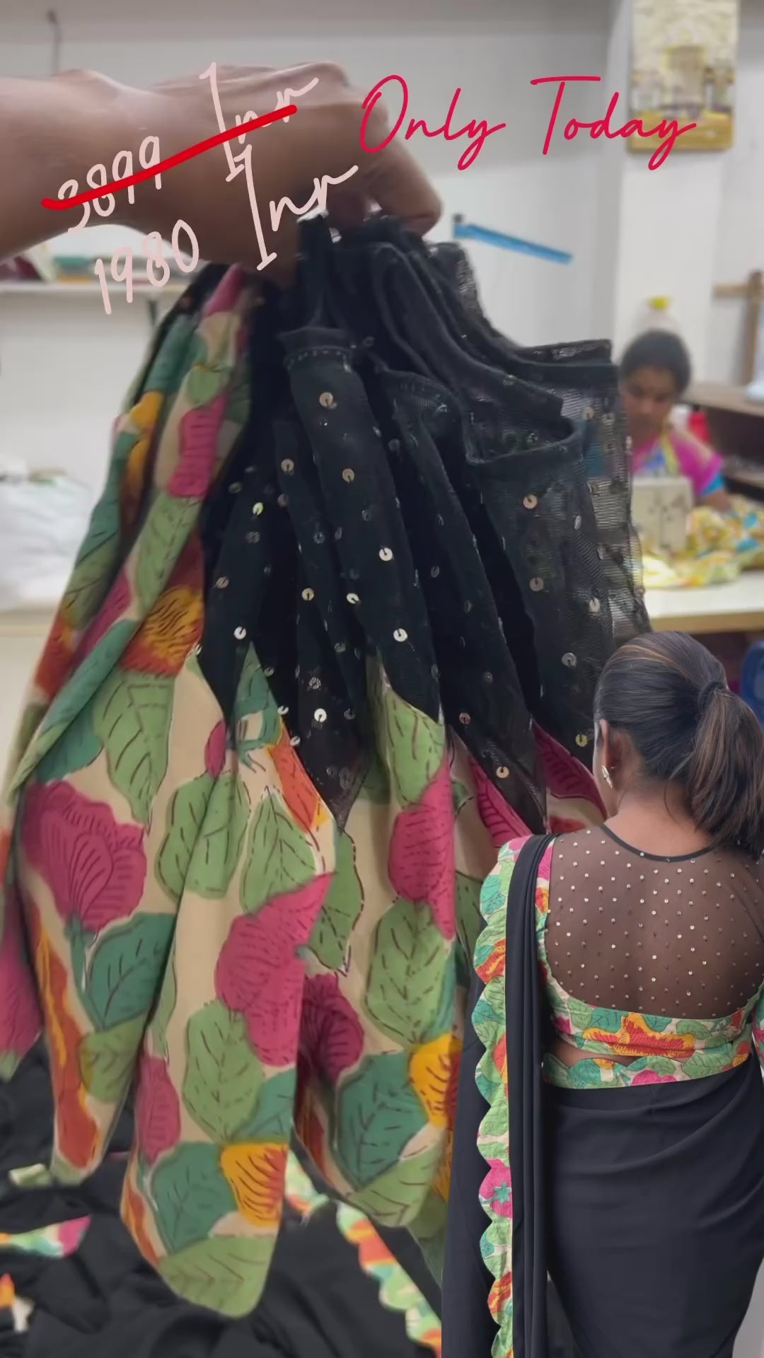 Black georgette saree with floral cotton blouse
